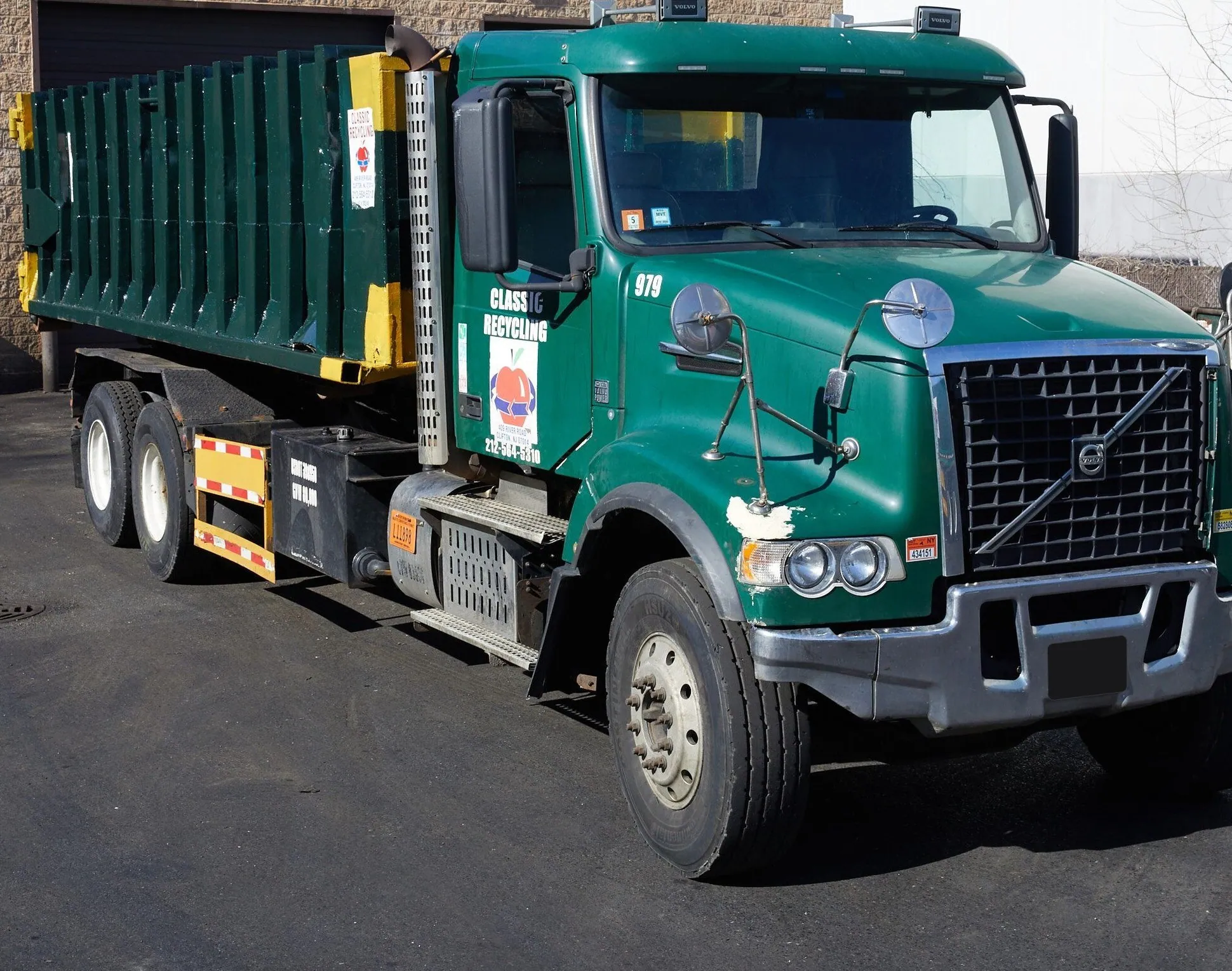 Classic Recycling waste compactor service truck