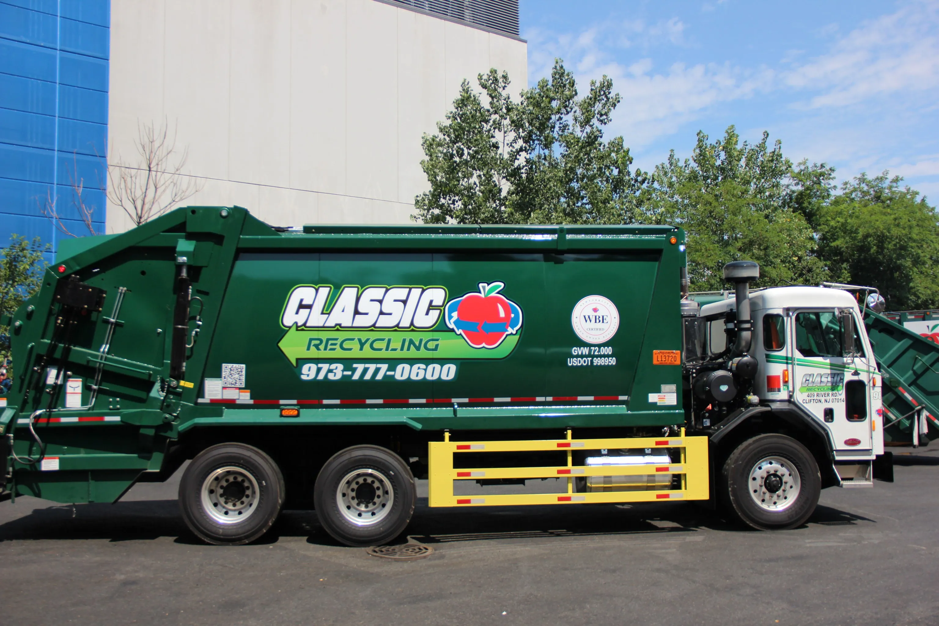 Classic Recycling truck at the company yard, seen from the side