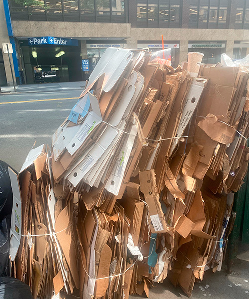 Carboard bailed and tied together for collection Classic Recycling New York